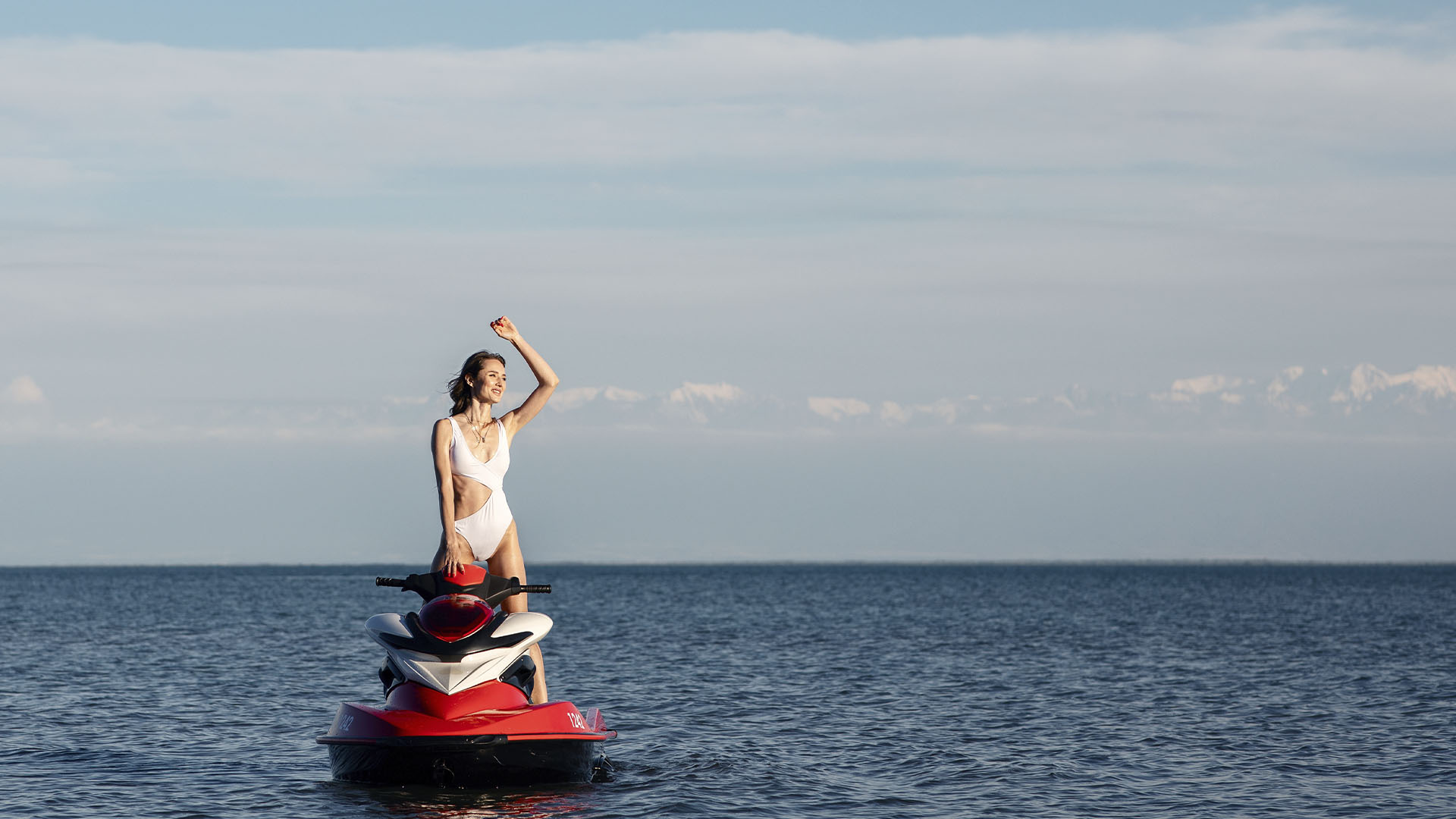 galeria_0000s_0013_young-slender-attractive-woman-in-a-white-swimsu-2022-11-16-07-41-45-utc